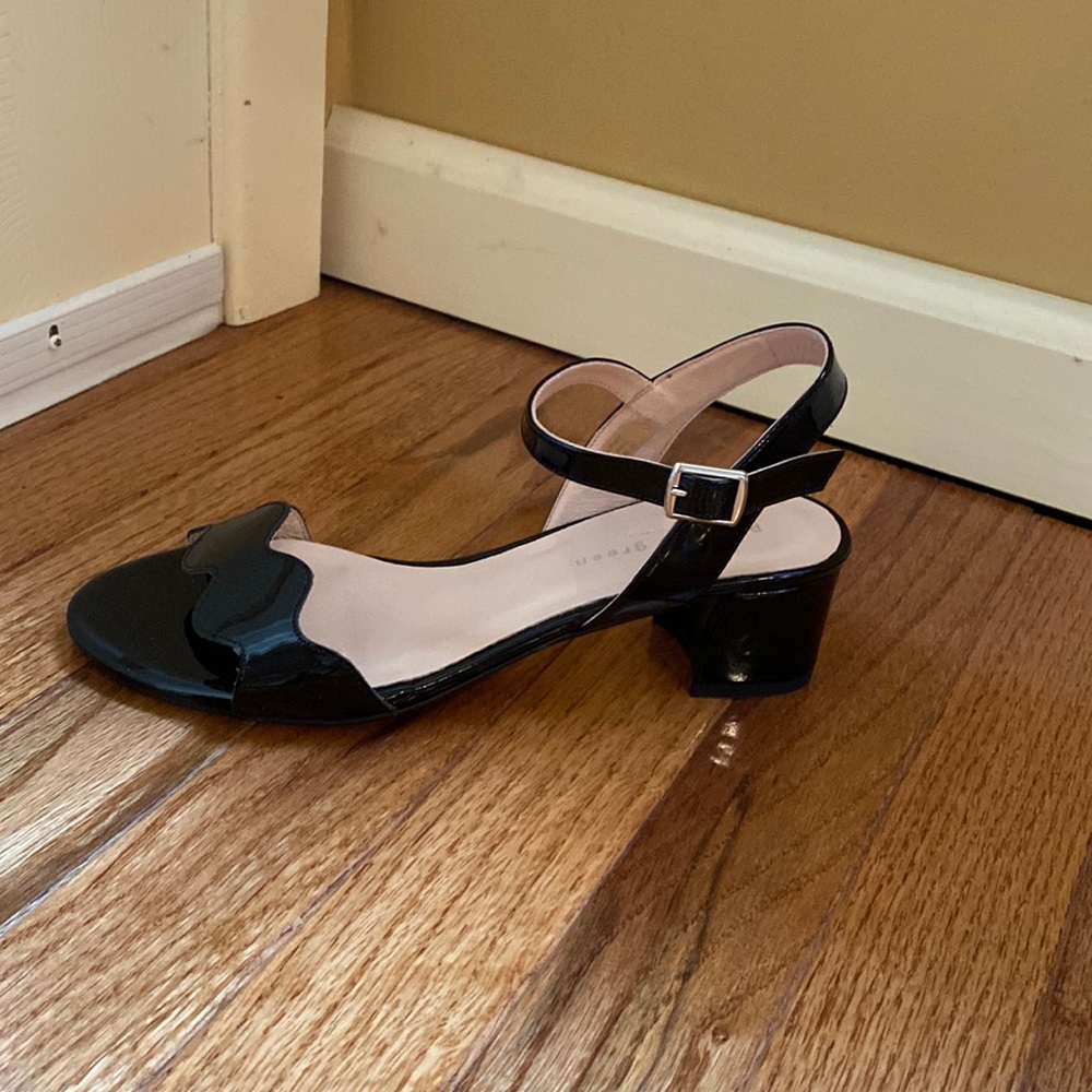 Black patent leather sandal by  Patricia Green